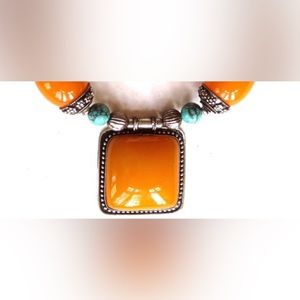 Tibet Turquoise and apricot resin vintage pendant necklace. 22” to 25”,